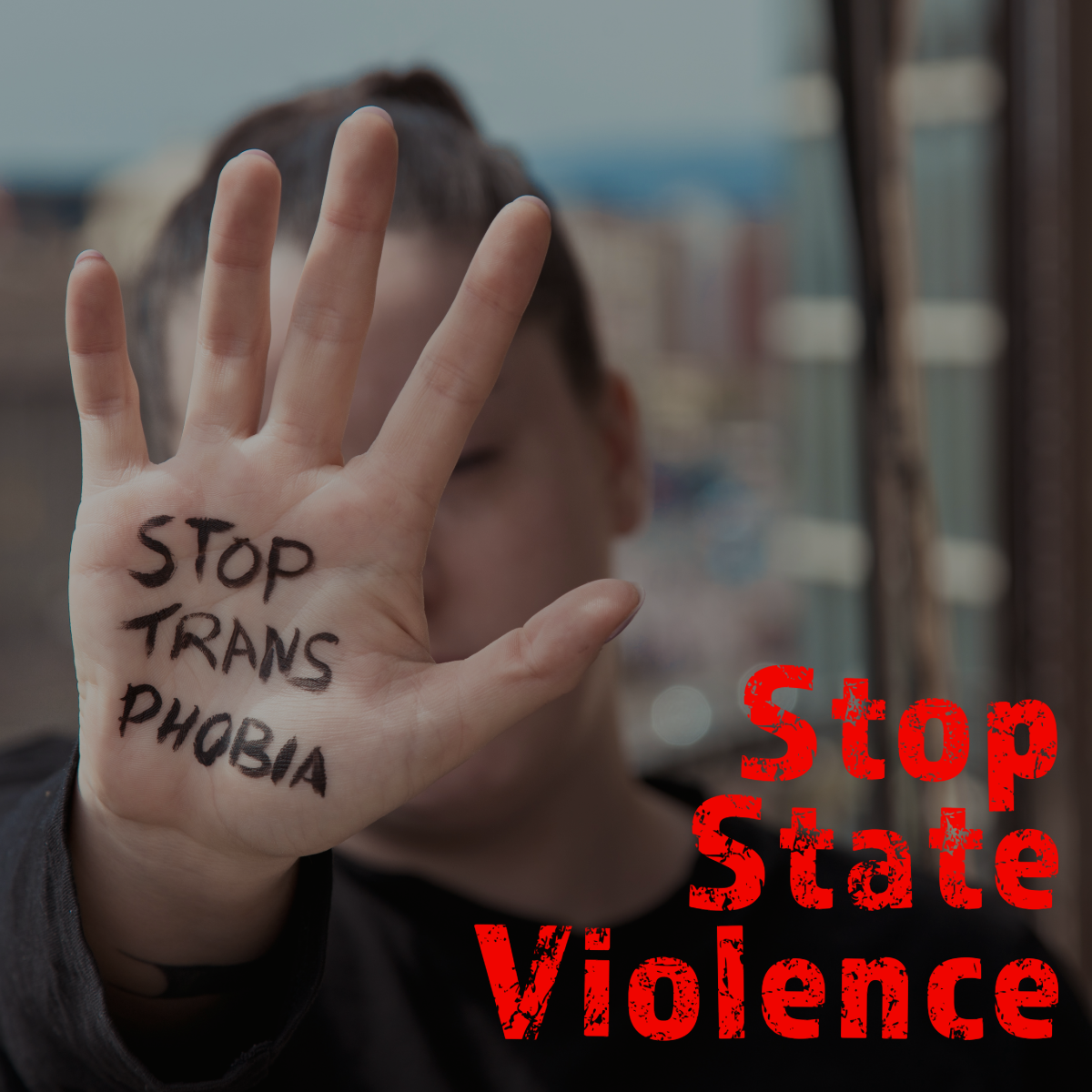 image of trans person with text on open hand reading 
                stop trans phobia and text reading stop state violence